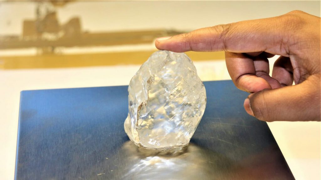 A 1,098 carat diamond, discovered in Botswana and believed to be the third largest gem-quality stone ever to be mined, is seen in this undated handout picture received June 16, 2021. Debswana Diamond Company